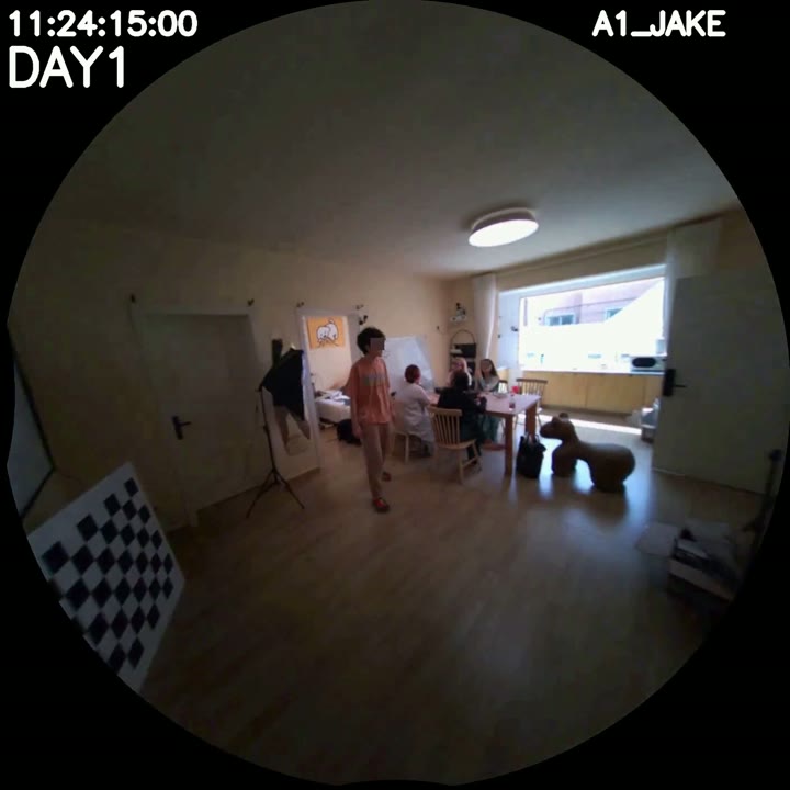 Jake walks toward the dining table at 11:24:15